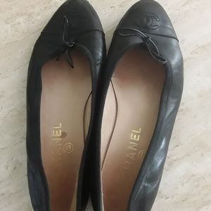 Woman's dark blue Chanel designer shoes seven and